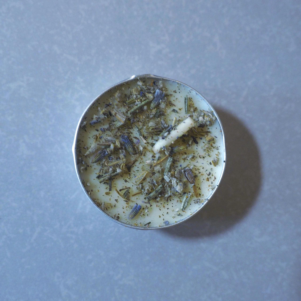Cleansing ritual candle for energy purification.